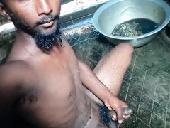Witness this mischievous Indian grandpa fuck a youthful stud in a steamy shower